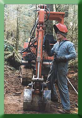 Will Turner repairing Kubota in the field:  Welding cracks in boom.
