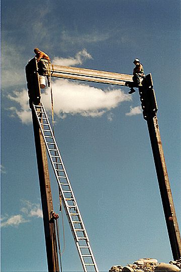 Keith Monohan and Carroll Vogel at tower top, Meriwether Bridge west abutment.
