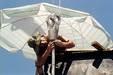 Marco Ernandes sealing socket with putty.