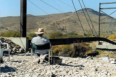 Senior Engineer Al "Mike" Highberger contemplates the action.