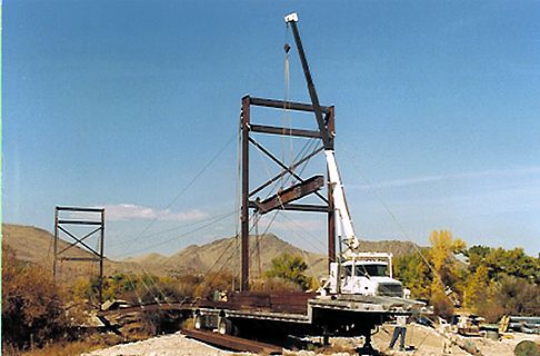 Preparing to launch downriver stringer mid-section, Meriwether Bridge.