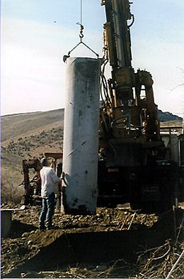 Bernie Parrow guiding casing into shaft.