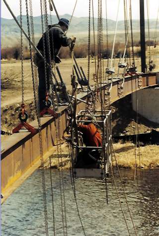Working from above and below to make up a splice joint at Clarks Crossing.
