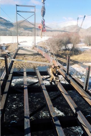 Setting floor beams and stringers on Meriwether Bridge.