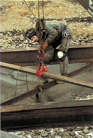 Placing diagonal bracing.