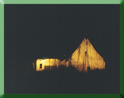 Base Camp:  Wall tent at night.